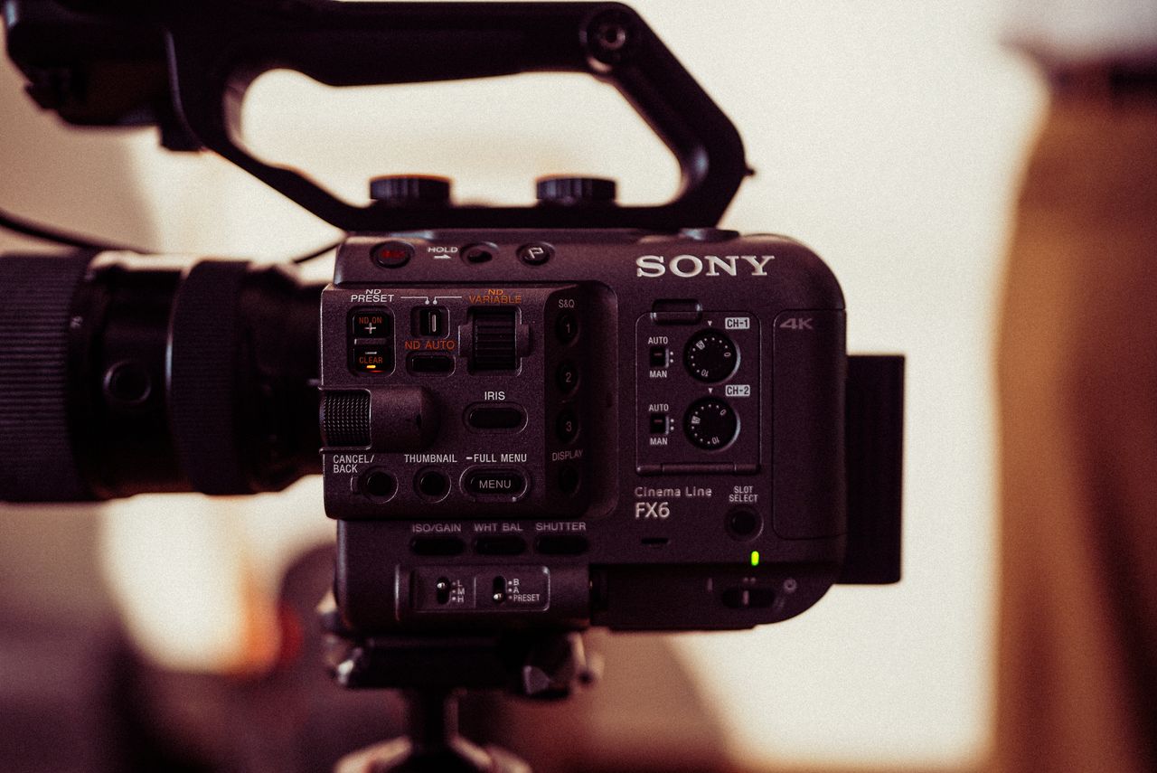 Detailed view of a professional cinema camera used for filming, highlighting control settings.